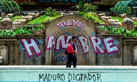 Graffiti in Caracas reads ‘we are hungry’. The country’s dire economic situation has caused shortages of food and medicine.