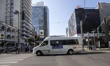 The first public bus operated on Shabbat, drives through central Tel Aviv.