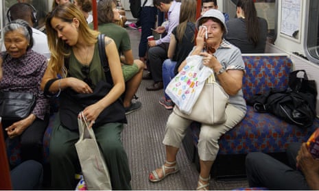 Hot travellers on the tube in London