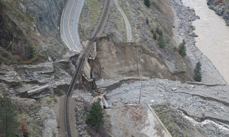 Railway tracks  suspended above the washed-out Tank Hill underpass of the Trans Canada Highway 1 after devastating rain storms caused flooding and landslides, northeast of Lytton, British Columbia