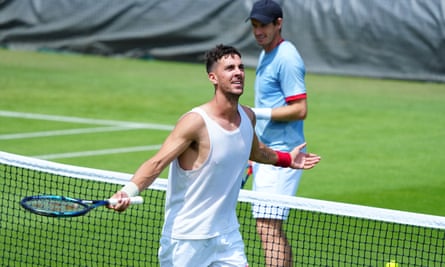 Thanasi Kokkinakis and Andy Murray during practice at Wimbledon last June