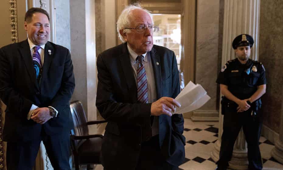 Bernie Sanders heading to the Senate chamber on 26 April.
