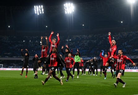 Milan’s players celebrate at the end of the game.