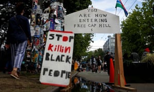 Police say they were met by a ‘violent crowd’ as they tried to investigate a shooting in Seattle’s Capitol Hill Autonomous Zone
