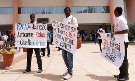 Activists outside the Dakar courthouse