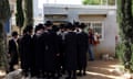 Ultra-Orthodox Jews line up at a military recruitment office
