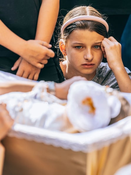‘You are trying to breathe, but you can’t’ … a girl at the coffin of two-year-old Anhelina Halych, killed in a Russian strike on Kyiv.