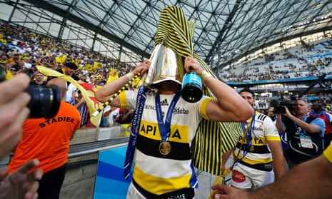 La Rochelle’s Matthias Haddad celebrates with the trophy after the Heineken Champions Cup final.