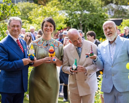 Alan Titchmarsh, Francis Tophill, Tom Allen and Bill Bailey with their gnomes at the Chelsea flower show on Monday.