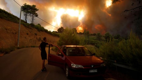Wildfires burn out of control in Greece and Turkey as thousands flee | Wildfires | The Guardian