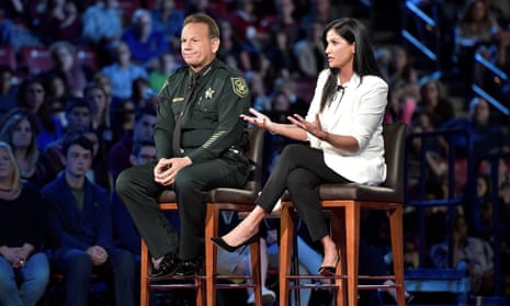 National Rifle Association spokesperson Dana Loesch answers a question while sitting next to Broward Sheriff Scott Israel during a CNN town hall meeting.