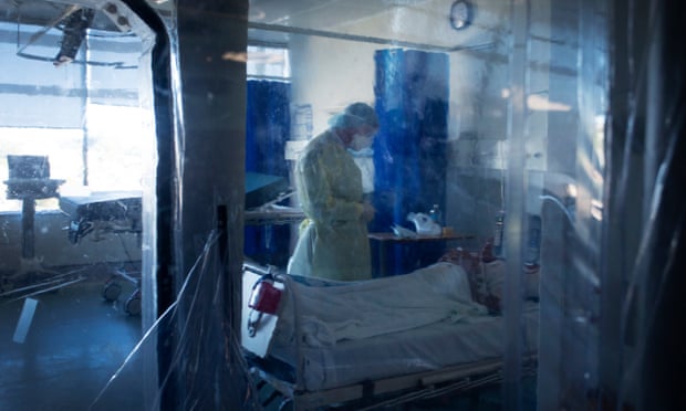 doctor in PPE in a Covid ward