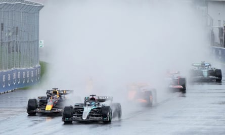 Mercedes’ George Russell (second left) and Max Verstappen in Montreal