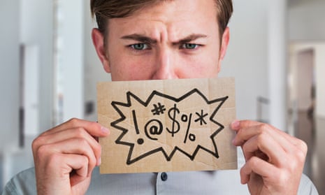 Man holding swear word sign in front of his mouth