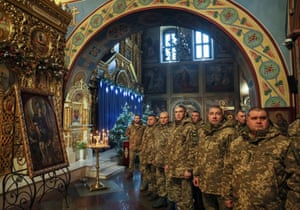 Servicemen attend a special Christmas service for Ukrainian Armed Forces at Mikhailovsky Zlatoverkhy Cathedral, Kyiv, Ukraine