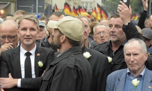 AfD leader Björn Höcke, left, with Pegida founder Lutz Bachmann, second from right, in a commemoration march in Chemnitz in September.