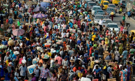 Panic buying at Oke-Odo market, Lagos after Covid measures were introduced in Nigeria.