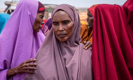 Haleema Abdullahi Abdi waits in line for the water at a camp for displaced people in Luglow, southern Somalia.