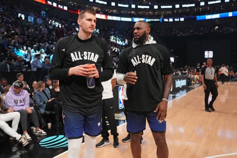 LeBron James, right, and Nikola Jokić look on during the 2023 NBA All-Star Game in Salt Lake City, Utah.