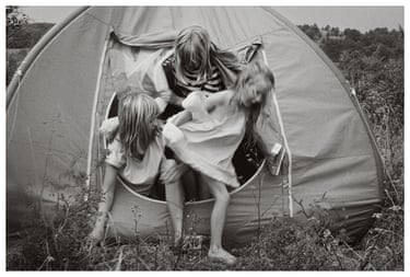 Mary Nolan’s Tessa, Celia and Alice emerging from a tent on a trip through France.
