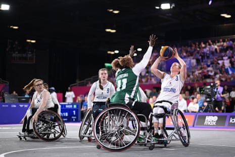 Chituru Nwaozuzu of Nigeria attempts to block a shot by Scotland’s Robyn Love during the 3x3 women’s wheelchair basketball pool match.