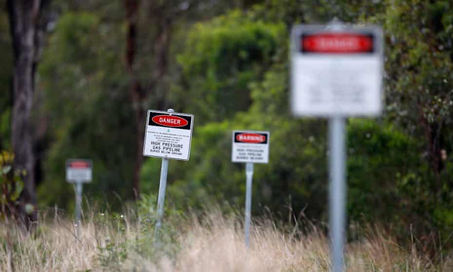 Signs warn of an underground gas pipeline near Dalby, 180 km (112 miles) west of Brisbane
