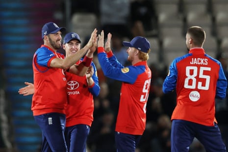 England's Jamie Overton celebrates after taking a catch to dismiss Sri Lanka's Pathum Nissanka off the bowling of Will Jacks.
