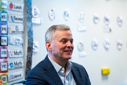 a man speaks in a classroom
