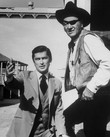 Robert Evans on set with with the actor John Wayne in 1969.