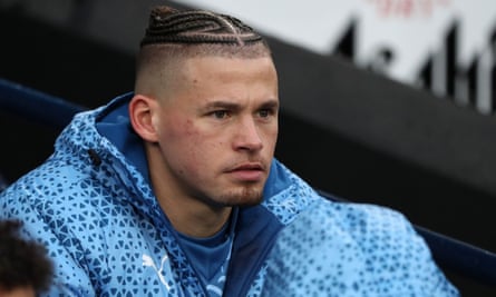 Kalvin Phillips of Manchester City looks on from the substitutes bench against Sheffield United