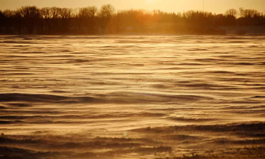 Snow drifts in a farmer’s field just outside Emerson.