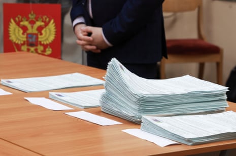 Ballots are compiled in piles, as members of an electoral commission count votes, after polling stations closed on the final day of the presidential election in St Petersburg on 17 March 2024. REUTERS/Anton Vaganov
