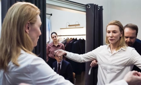 Conductor Lydia Tár (Cate Blanchett) is measured up for expensive tailoring in a scene from the 2022 film Tár.  