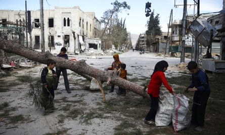 Children collecting wood in the besieged town.