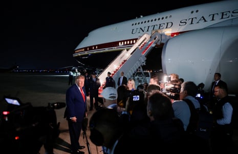 Donald Trump speaks to members of the media after disembarking Air Force One at Joint Base Andrews, Maryland, on Tuesday.