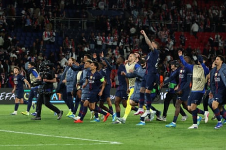 Players of PSG greet supporters as they celebrate their 5-4 victory over Bayern Munich.