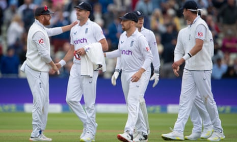 Jimmy Anderson gets a handshake from Jonny Bairstow after picking up his fifth wicket