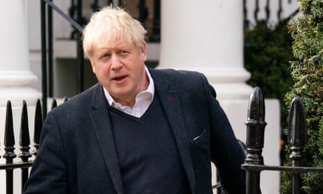 Boris Johnson outside his house in March.