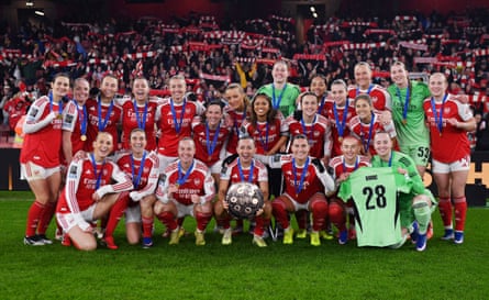 Arsenal team celebrate with the FIFA Women's Champions Cup trophy