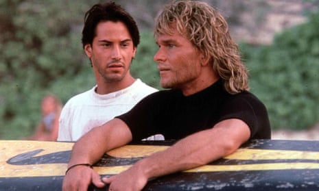 Keanu Reeves as FBI rookie Johnny Utah and Patrick Swayze as surfer/bank robber Bodhi in the 1991 action film Point Break.