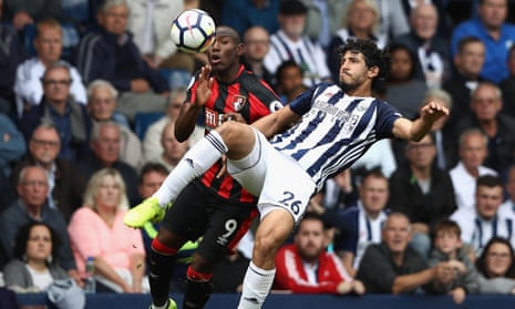West Brom’s scorer Ahmed El-Sayed Hegazi clears from Bournemouth’s Benik Afobe at The Hawthorns.