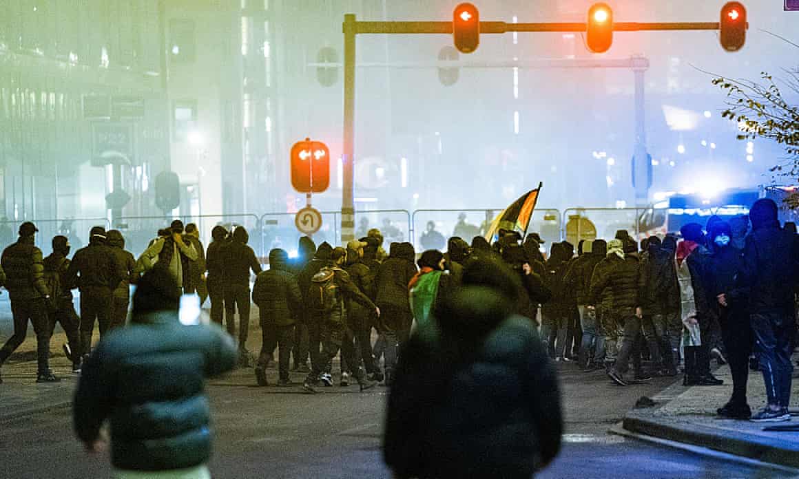 Pro-Palestinian protesters gathered in a street in Amsterdam
