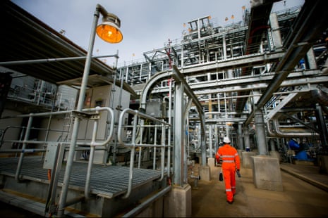 A worker walks through the Curtis Island liquefied natural gas (LNG) plant in Queensland. 