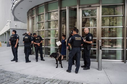 police stand outside a building