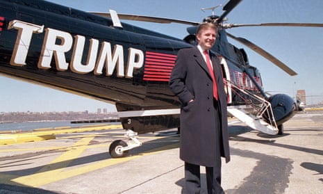 Donald Trump poses in front of a helicopter in 1988.