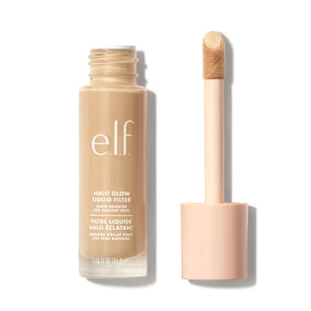A beige open tube of E.L.F Halo Glow Liquid Filter with the wand next to it