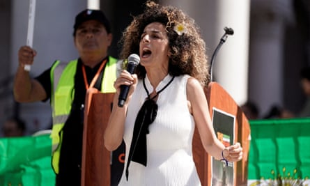 Masih Alinejad addresses demonstrators at a rally in Los Angeles in October in support of Iranian women and against the death of Mahsa Amini.