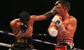 Anthony Crolla right takes a left hand from Jorge Linares at Manchester Arena on Saturday