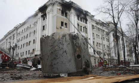 A rocket fragment lies on the ground next to a building of Ukrainian Security Service (SBU) after a rocket attack in Kharkiv, Ukraine’s second-largest city, Ukraine, Wednesday, March 2, 2022.