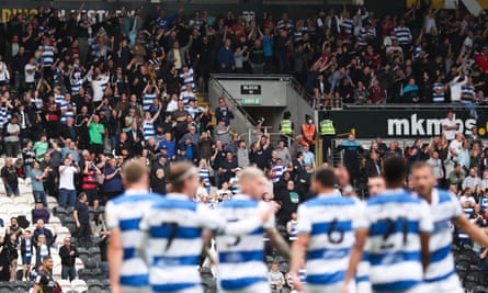 QPR supporters celebrate a goal at Hull this season